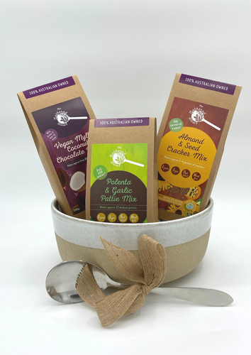 This delightful large Gift Bowl contains a large multipurpose two tone glazed bowl, a Gathered Bowl Pattie Mix, a Gathered Bowl Cracker Mix, a Gathered Bowl Raw Chocolate Mix and a metal spoon. This is a great gift for someone who cares about what they eat and loves to create their own food at home. Our mixes are super simple to make and are made from organic food. Our products are also packed in 100% home compostable packaging which means our food is good for you and the environment.
